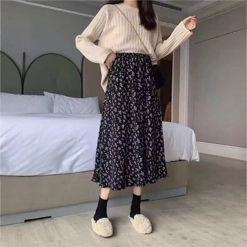 Jupe midi femme avec imprimé floral, taille cintrée à volants et qualité plissée légère
