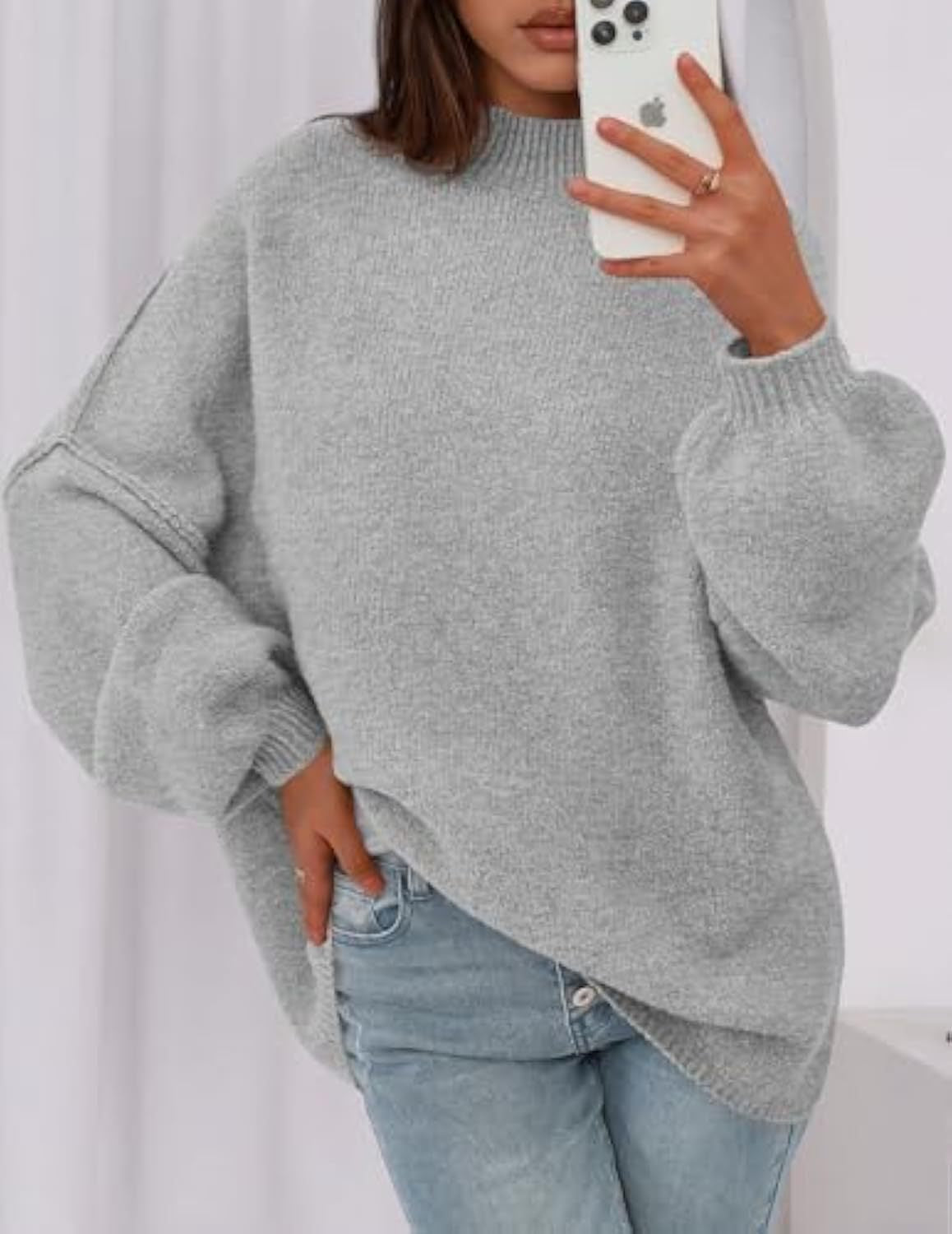 Pull en maille oversize pour femmes avec col montant et manches ballon