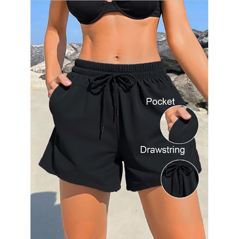 Shorts de sport pour femmes avec taille élastique et poches latérales pratiques R&B
