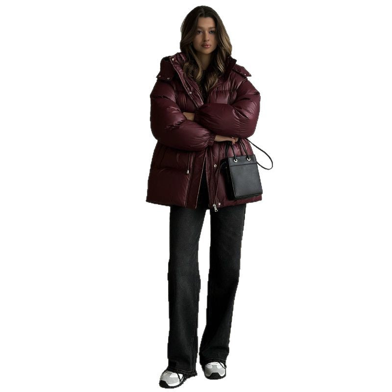Veste à capuche pour femmes avec cordon de taille ajustable et finition brillante