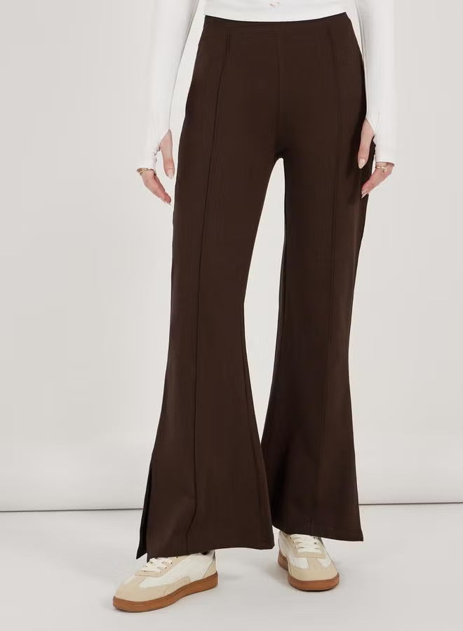 Pantalon évasé pour femmes à taille haute, avec pli permanent et fente latérale