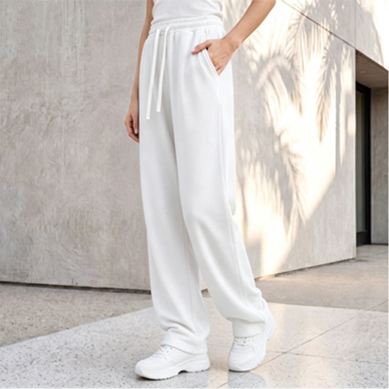 Pantalon palazzo lounge pour femmes avec taille confortable, cordon de serrage, poches latérales et couture décorative Echo Archiv