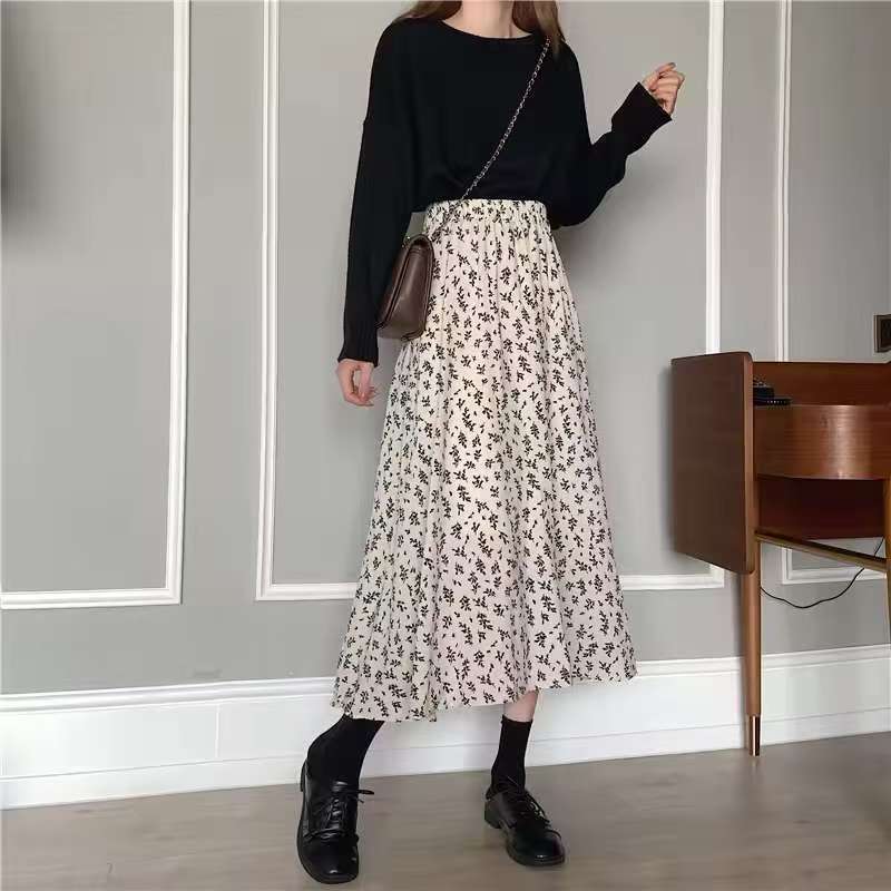 Jupe midi femme avec imprimé floral, taille cintrée à volants et qualité plissée légère