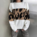 Pull oversized en tricot pour femmes avec des bandes léopard, épaules tombantes et ourlet côtelé