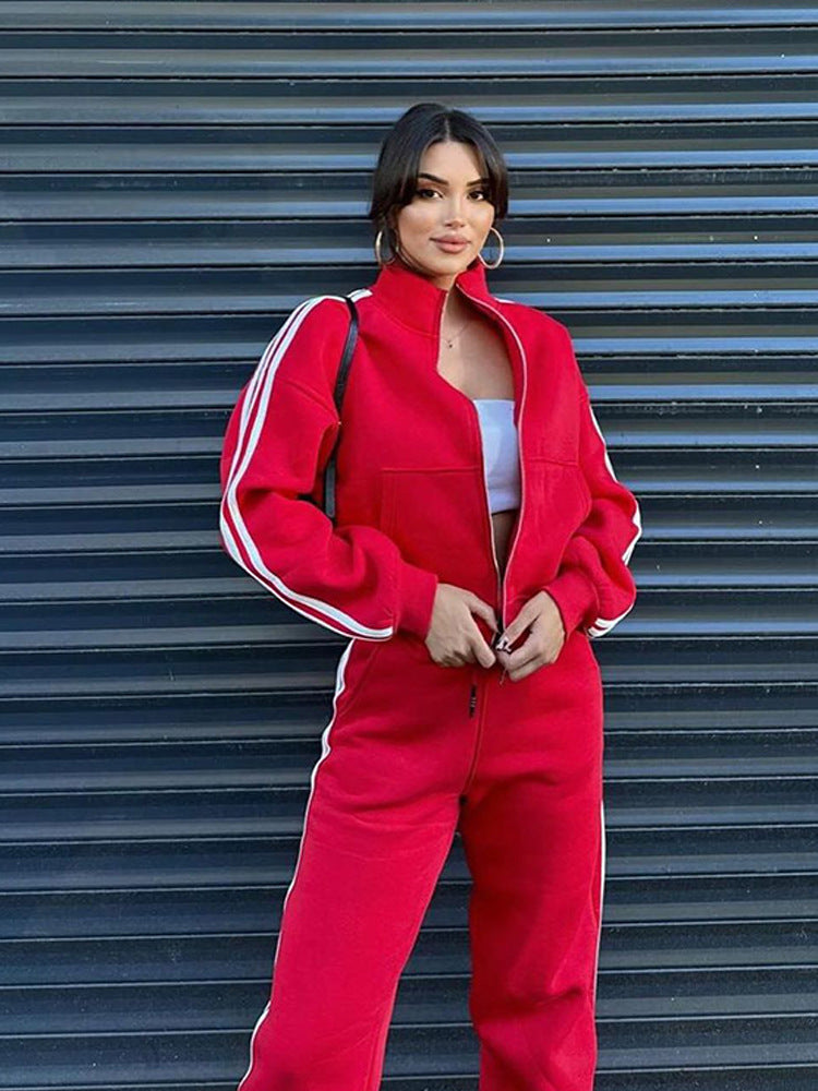 Ensemble de jogging féminin sport chic en deux parties avec col montant, fermeture éclair intégrale et bandes contrastées sur les côtés Echo Archiv