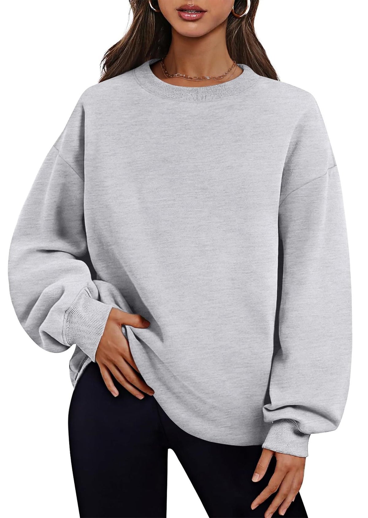 Pull-over long et oversize pour femmes avec poches latérales, bords côtelés et épaules tombantes Echo Archiv