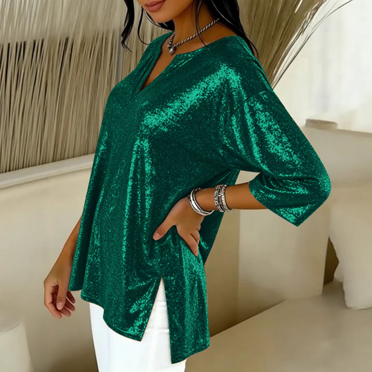 Tunique-blouse scintillante pour femmes avec décolleté en V, manches chauve-souris et fentes latérales Echoarchiv