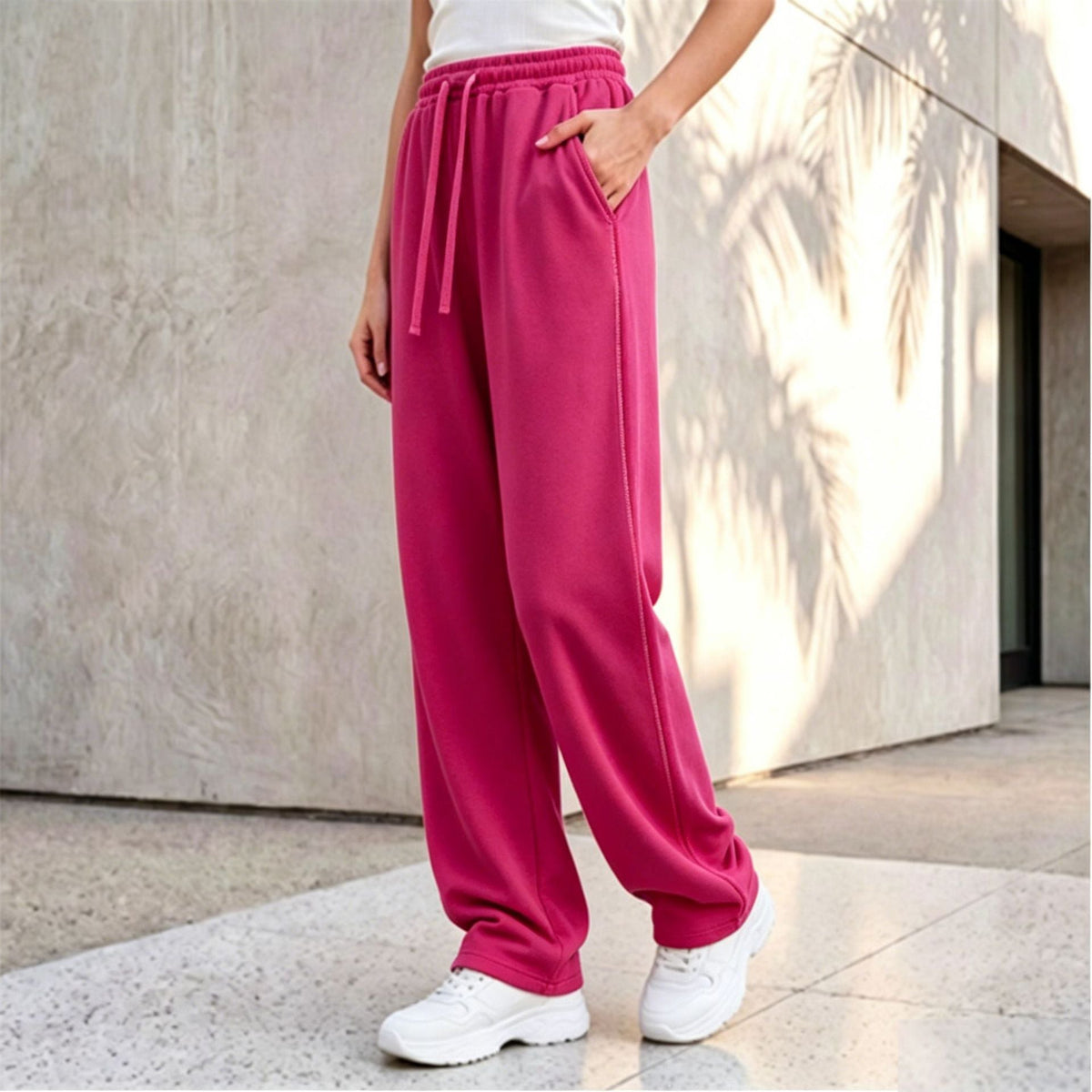 Pantalon palazzo lounge pour femmes avec taille confortable, cordon de serrage, poches latérales et couture décorative Echo Archiv