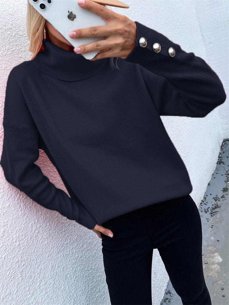 Pull à col roulé côtelé pour femmes avec coupe oversize et poignets à boutons décoratifs Echoarchiv