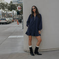 Robe sweat oversize pour femmes avec demi-fermeture éclair, manches ballon, poches latérales et ourlet volanté