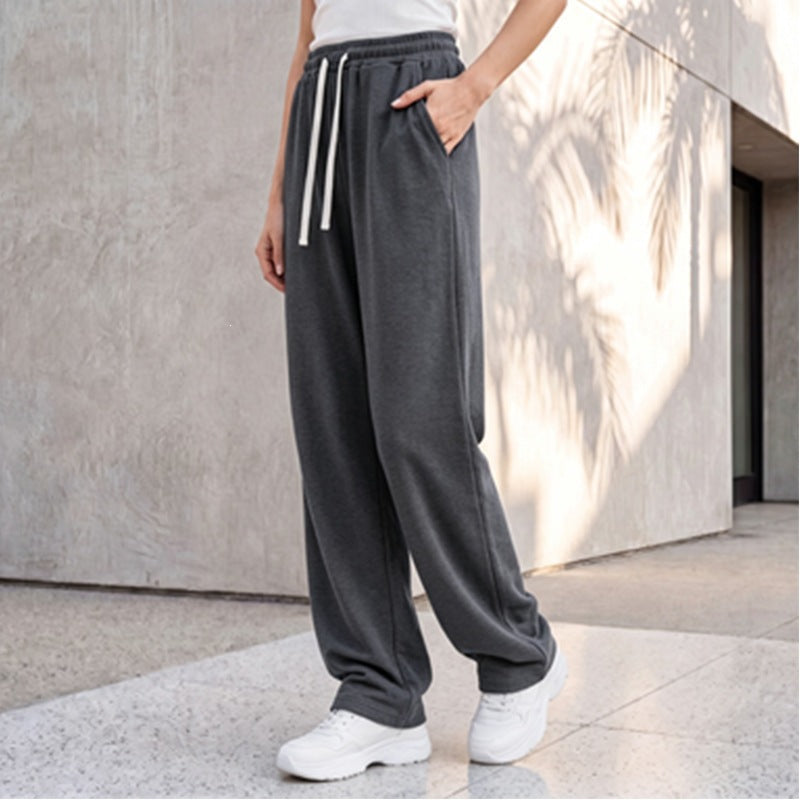 Pantalon palazzo lounge pour femmes avec taille confortable, cordon de serrage, poches latérales et couture décorative Echo Archiv
