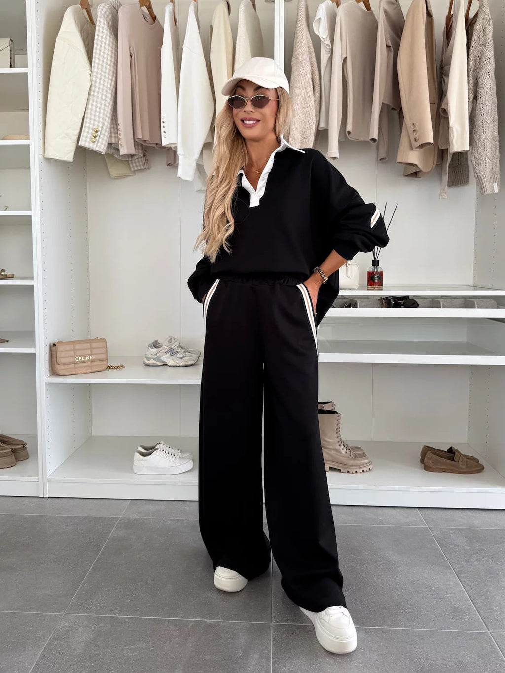Ensemble de détente féminin à la mode avec col polo, bandes de passepoil marquantes et pantalon jogger large