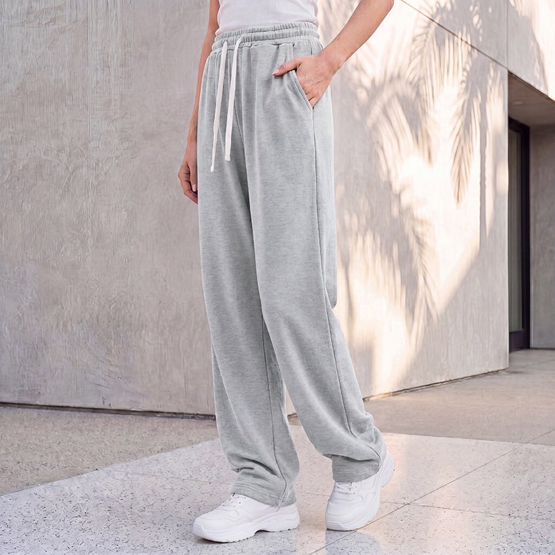 Pantalon palazzo lounge pour femmes avec taille confortable, cordon de serrage, poches latérales et couture décorative Echo Archiv