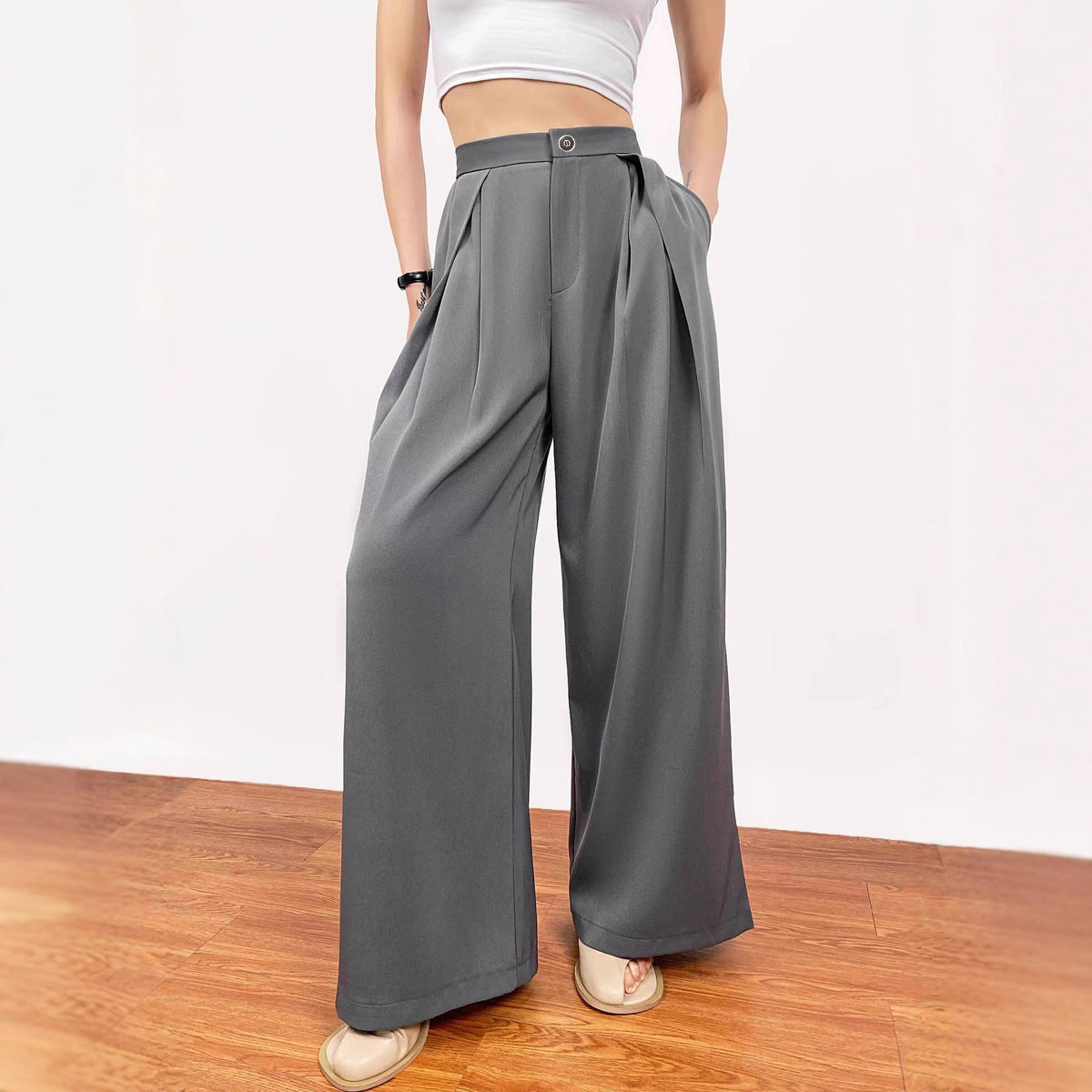 Pantalon plissé taille haute large pour femmes avec plis, passants de ceinture et poches