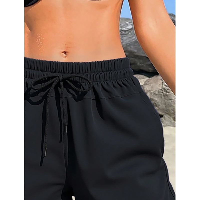Shorts de sport pour femmes avec taille élastique et poches latérales pratiques R&B