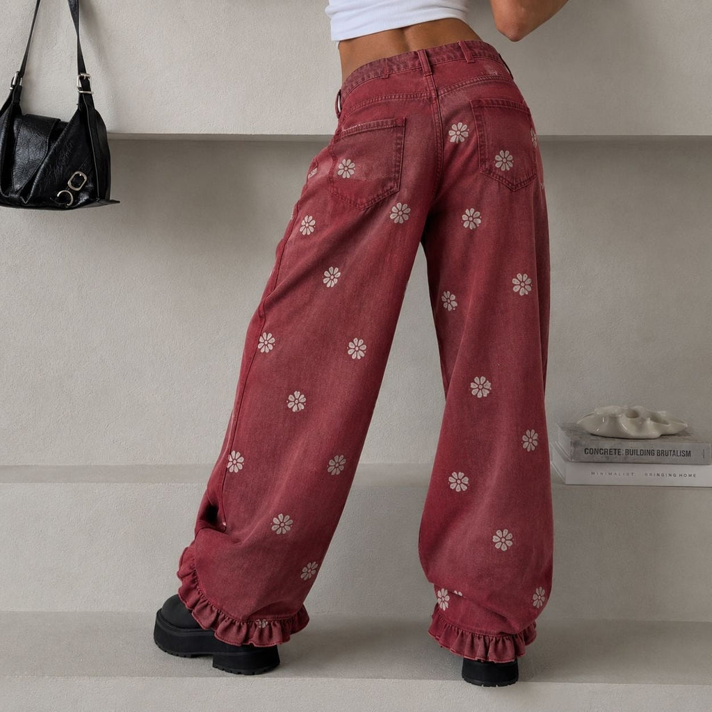 Pantalon en denim large pour femmes avec imprimé marguerite, taille haute et finition à volants Echo Archiv