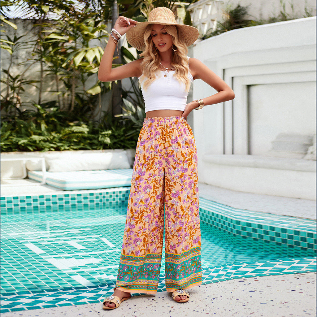 Pantalon palazzo pour femmes avec taille froncée, poches latérales et imprimé floral boho Echo Archiv