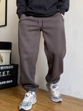 Pantalon de jogging tapered pour hommes avec couture d'entrejambe marquée, cordon de serrage et bords élastiques Echo Archiv