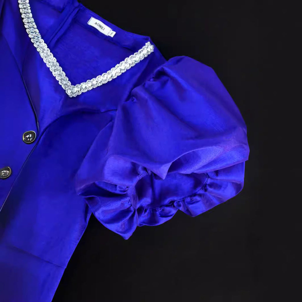 Robe de soirée glamour pour femmes avec des manches bouffantes volumineuses et un ourlet à franges R&B