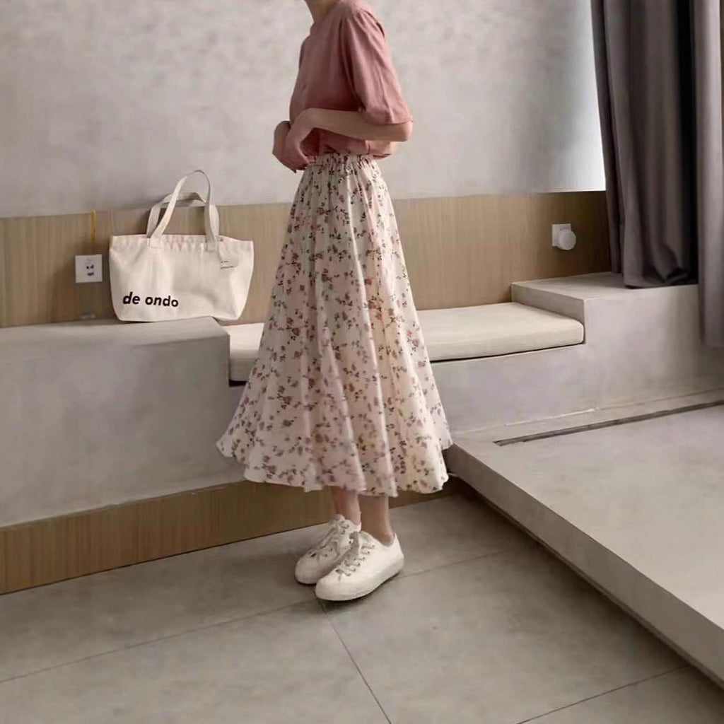 Jupe midi femme avec imprimé floral, taille cintrée à volants et qualité plissée légère