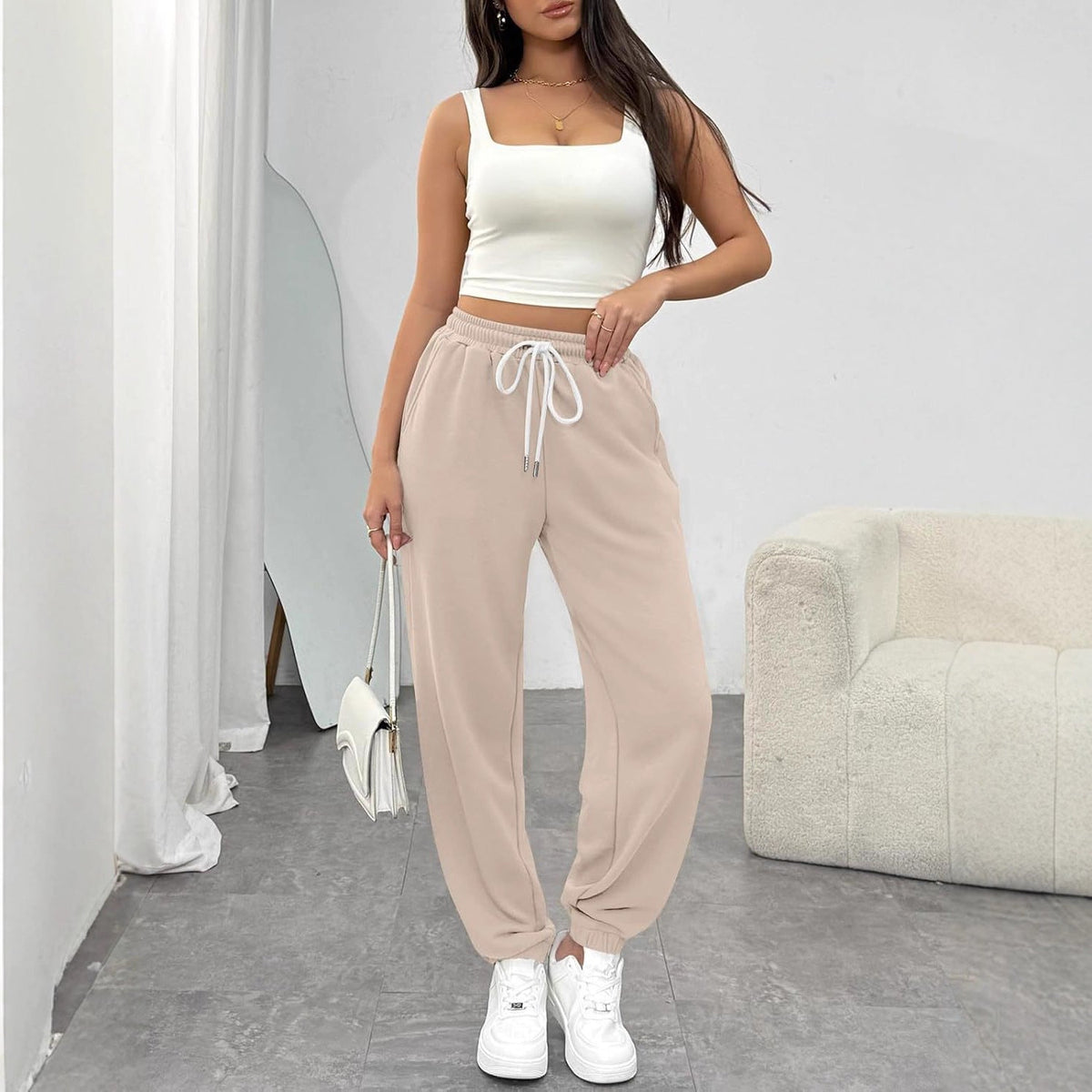 Pantalon de jogging taille haute pour femmes avec cordon de serrage, poignets élastiques et poches latérales Echoarchiv