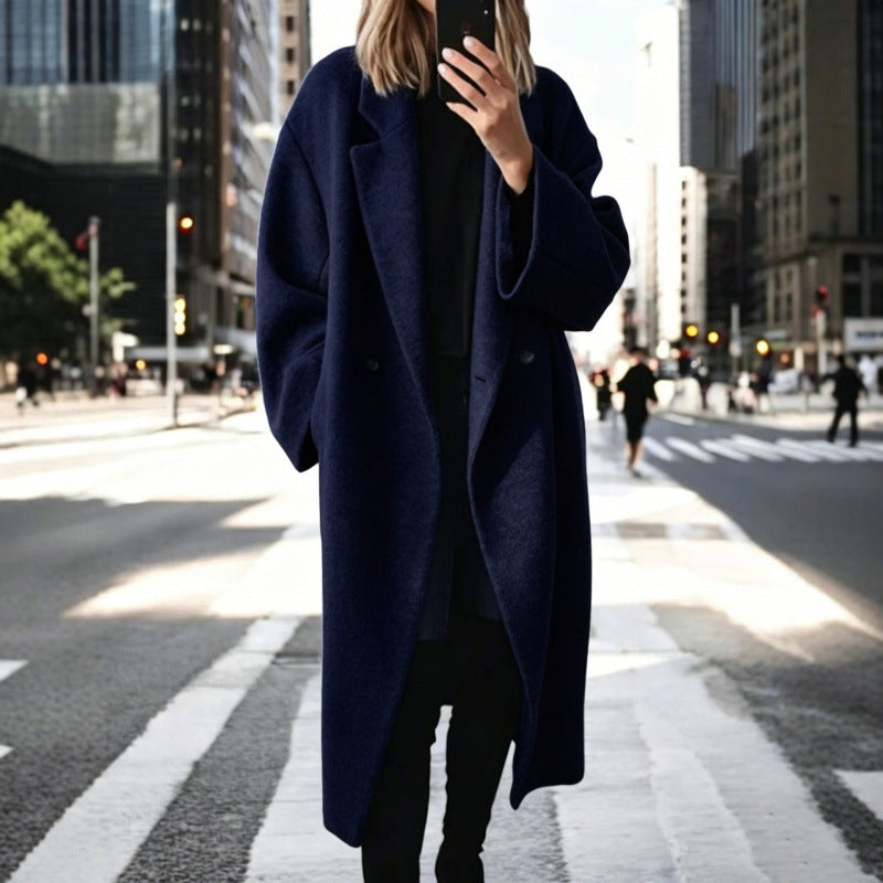 Manteau oversized en mélange de laine pour femmes avec double rangée de boutons, grand col à revers et poches passepoilées Echoarchiv