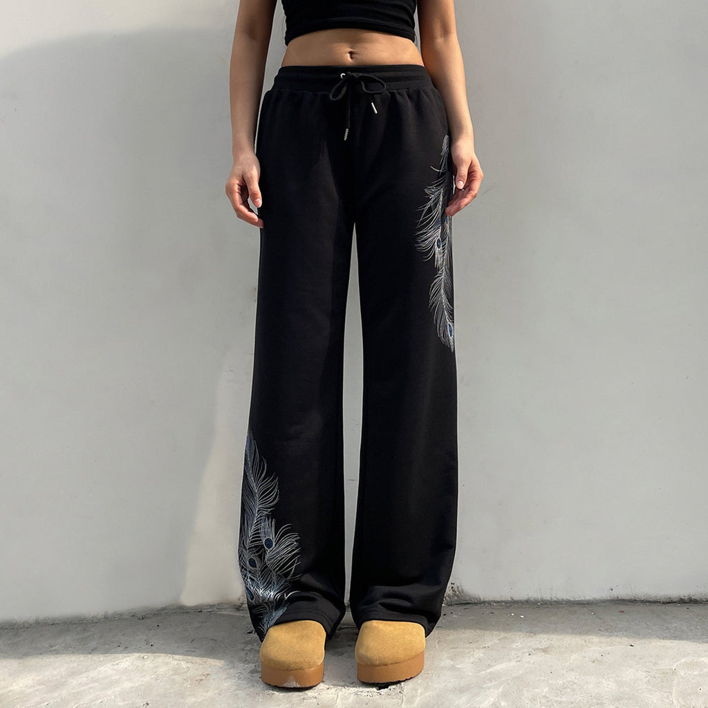 Pantalon de lounge large pour femmes avec cordon de serrage, taille confortable et imprimé de plume de paon Echo Archiv