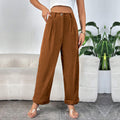 Pantalon en velours côtelé taille haute pour femmes avec jambe large, plis à la taille et ourlet retourné
