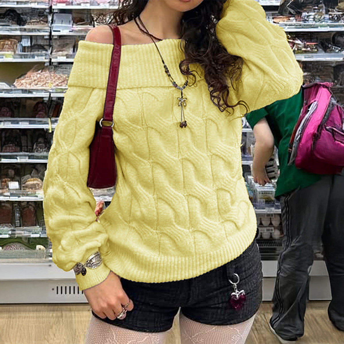 Pull en tricot épais sans épaules pour femmes avec motif en torsade, manches larges et bord-côte élastique Echo Archiv