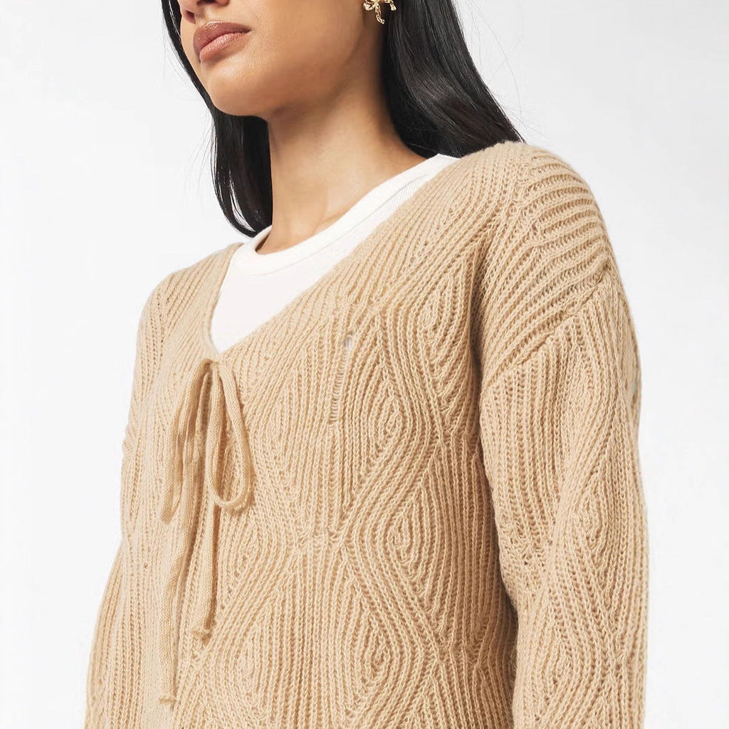 Pull-over en maille oversize pour femmes avec décolleté en V, cordon de serrage et structure en losanges