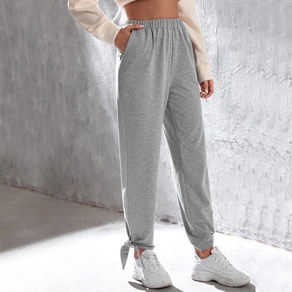 Pantalon de jogging décontracté pour femmes avec taille élastique haute, poches latérales et lien à la cheville