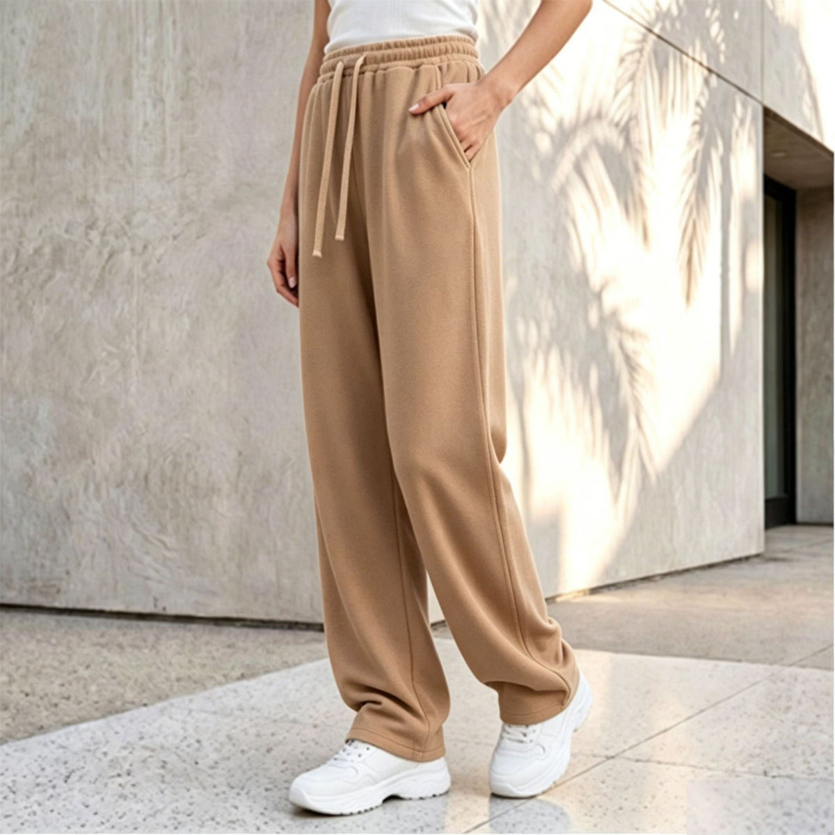 Pantalon palazzo lounge pour femmes avec taille confortable, cordon de serrage, poches latérales et couture décorative Echo Archiv