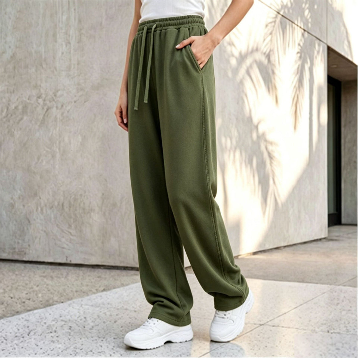 Pantalon palazzo lounge pour femmes avec taille confortable, cordon de serrage, poches latérales et couture décorative Echo Archiv
