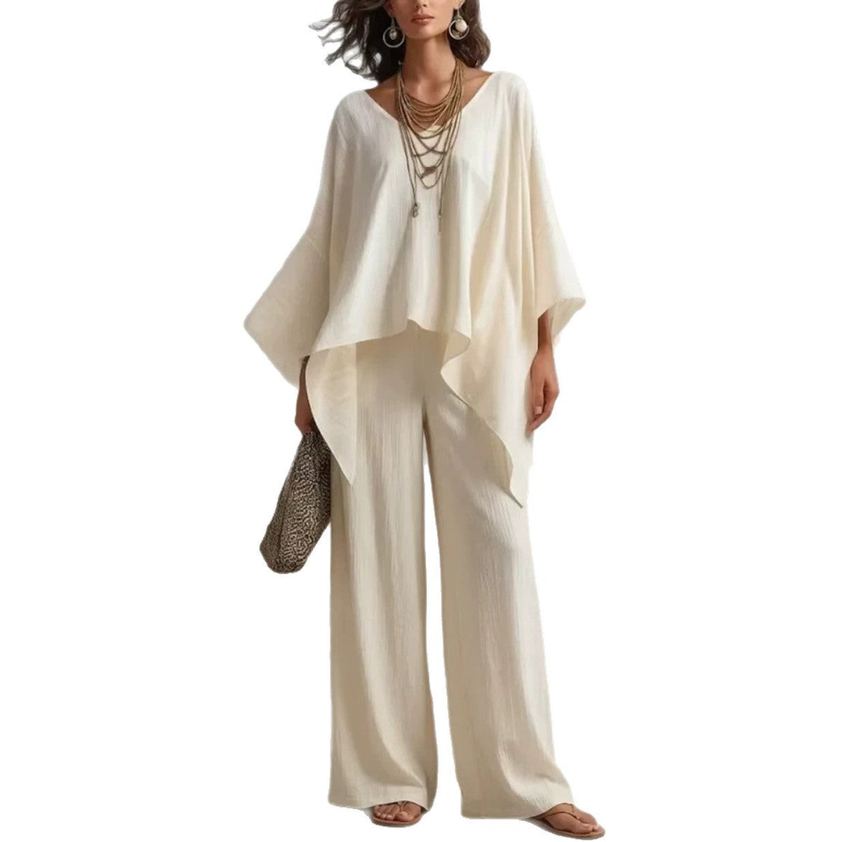 Ensemble féminin à deux pièces avec un haut poncho surdimensionné et un pantalon palazzo large EB