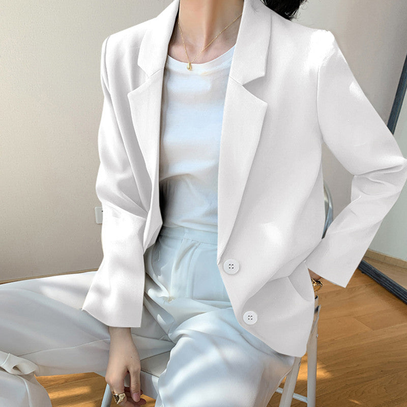 Blazer féminin à la mode avec boutons en perles
