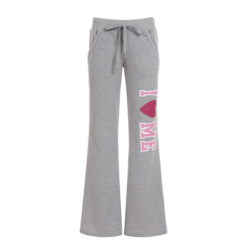 Pantalon de jogging évasé pour femmes avec cordon de serrage, poches latérales et imprimé Love frappant Echo Archiv