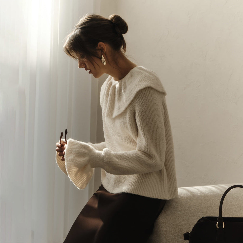 Pull pour femmes avec col roulé large et manches à volants