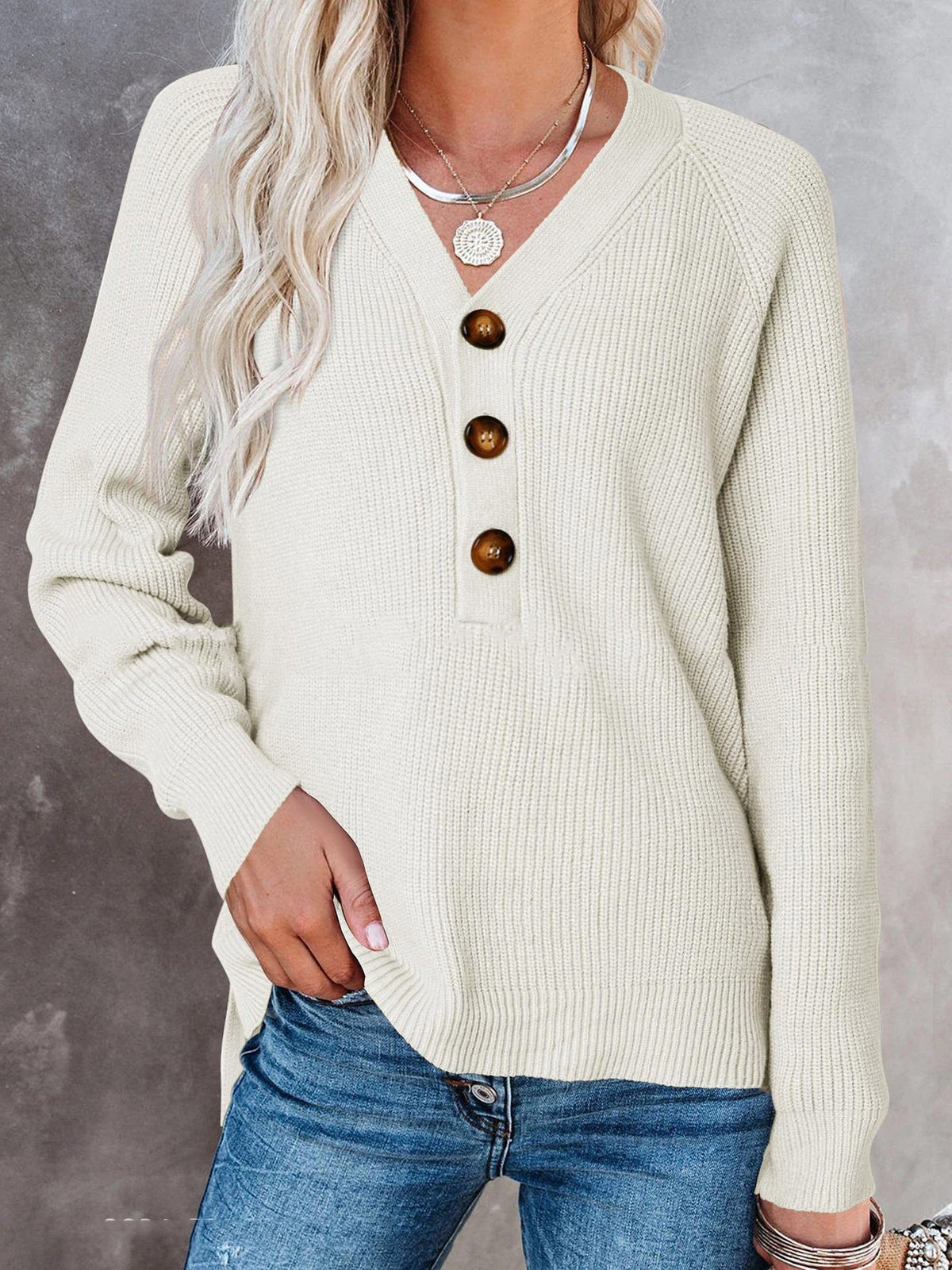 Pull en tricot côtelé pour femmes avec décolleté en V, patte de boutonnage décorative et manches ballon Echoarchiv