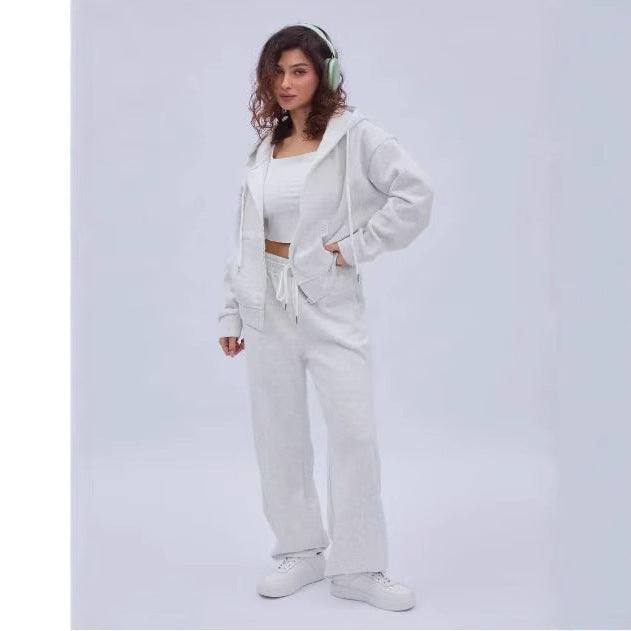Ensemble de loungewear pour femmes en deux pièces avec capuche à fermeture éclair, jogger taille haute à jambes larges et poches passepoilées Echo Archiv