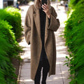 Manteau oversized en mélange de laine pour femmes avec double rangée de boutons, grand col à revers et poches passepoilées Echoarchiv