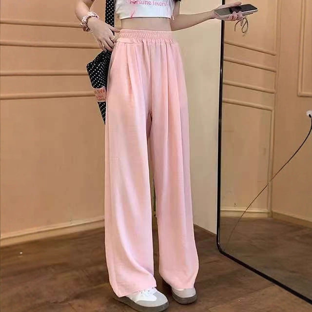 Pantalon palazzo large en look lin pour femmes avec taille haute, ceinture élastique et poches