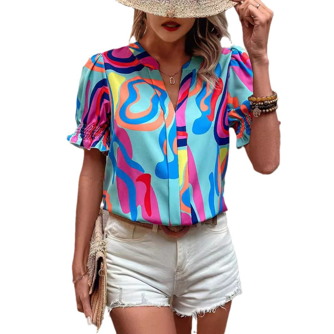 Chemisier pour femmes avec des manches bouffantes et un design graphique créatif R&B