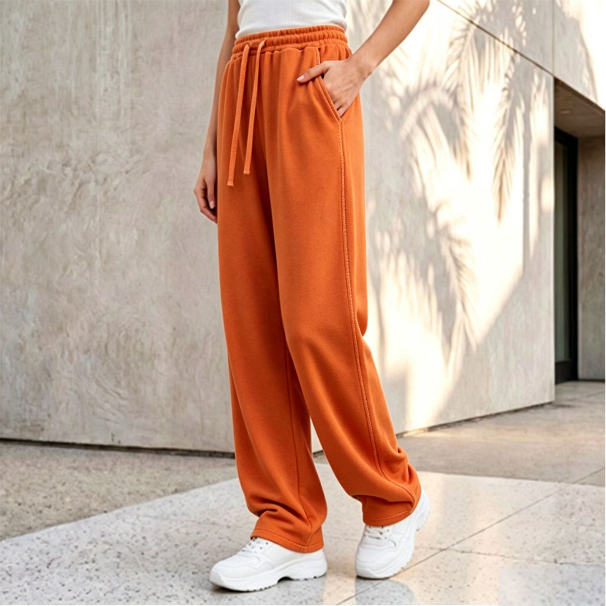 Pantalon palazzo lounge pour femmes avec taille confortable, cordon de serrage, poches latérales et couture décorative Echo Archiv