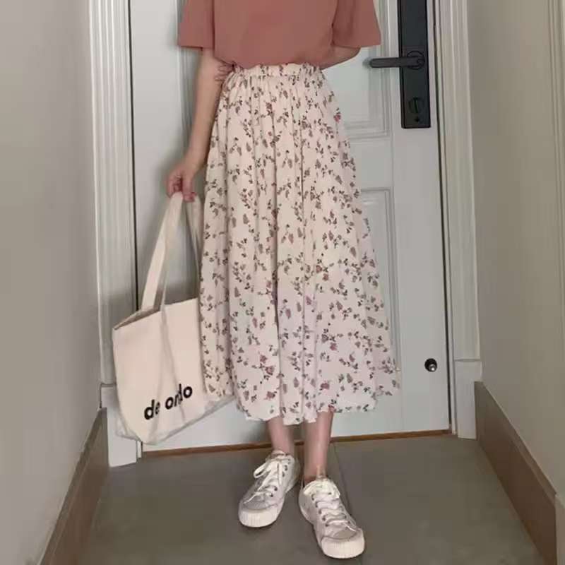 Jupe midi femme avec imprimé floral, taille cintrée à volants et qualité plissée légère