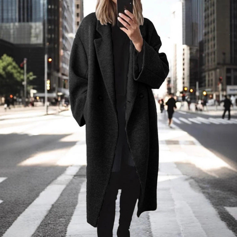 Manteau oversized en mélange de laine pour femmes avec double rangée de boutons, grand col à revers et poches passepoilées Echoarchiv
