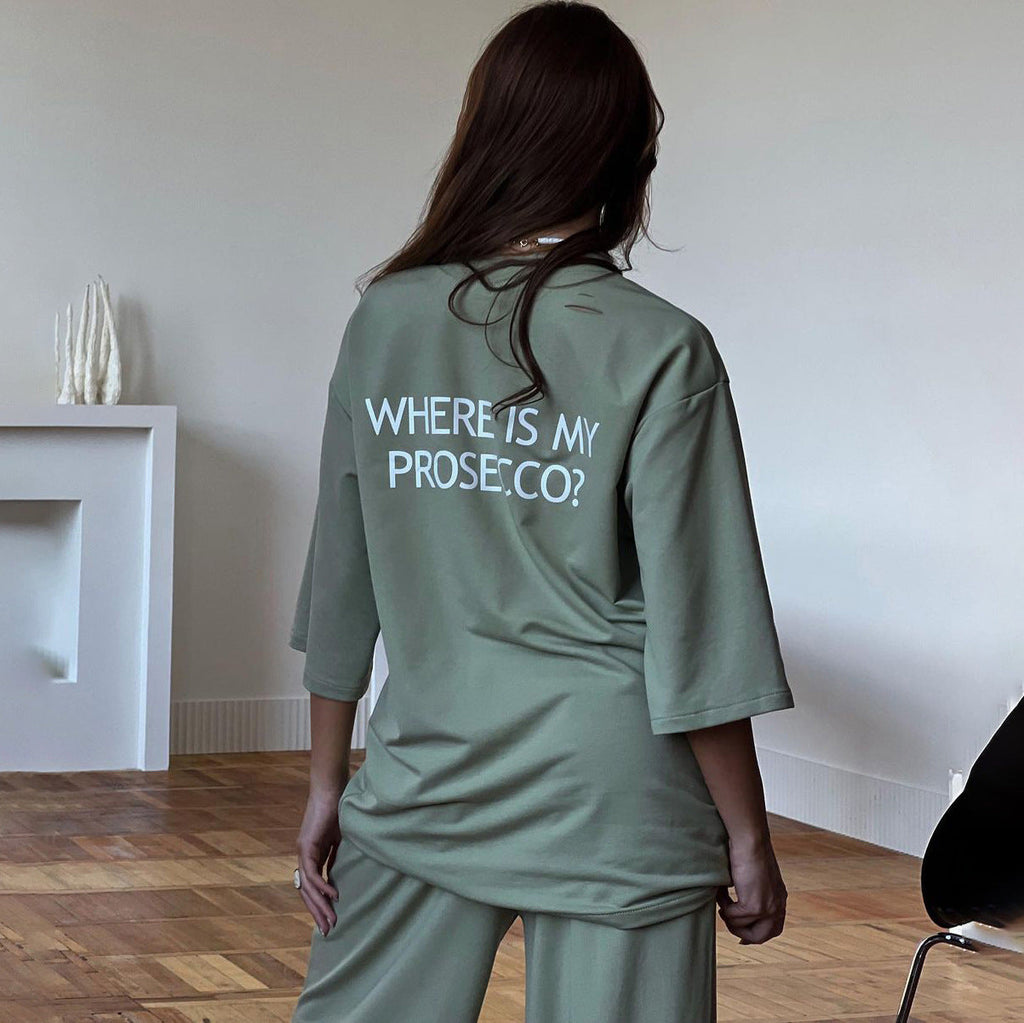 T-shirt long oversized pour femmes avec impression statement, manches trois-quarts et silhouette tunique décontractée