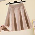 Jupe en tricot longueur mollet pour femme avec motif en torsade