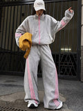 Ensemble de jogging ample pour femmes en polaire de coton avec fermeture éclair et bandes contrastées latérales Echoarchiv