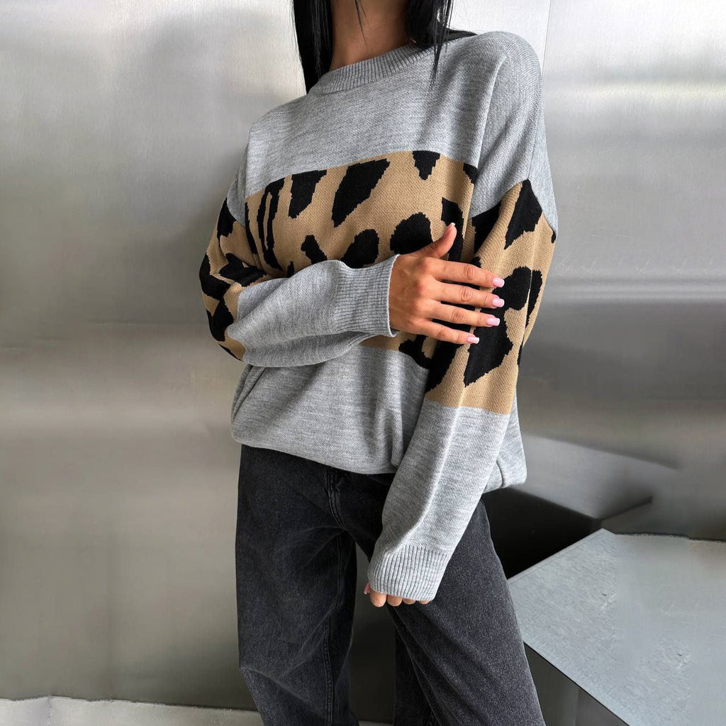 Pull oversized en tricot pour femmes avec des bandes léopard, épaules tombantes et ourlet côtelé