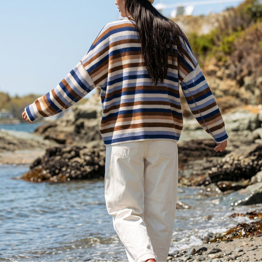 Pull en tricot rayé pour femmes avec col polo et patte de boutonnage Echoarchiv